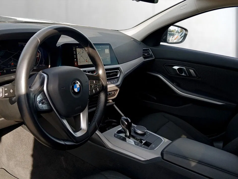 BMW 320d Touring Adv. Aut. | Bild 7 von 24